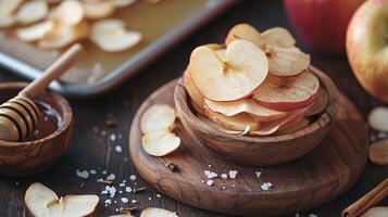 Delicate Dried Apple Slices with a Touch of Honey and Cinnamon A Perfect Autumnal Treat photo