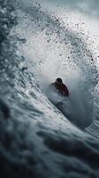 A man riding a wave on a surfboard photo