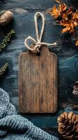 Cozy Autumn Still Life Rustic Wooden Board with Knit Sweater and Fall Leaves. Perfect for Thanksgiving, Fall, or Winter projects. Create warm and inviting designs with this image. photo