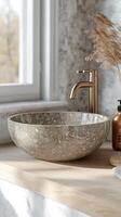 Modern Luxury Bathroom Design with Elegant Stone Sink and Minimalist Faucet. This image showcases a trendy and stylish bathroom in photo