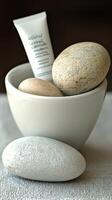 Spa Day Serenity Smooth Stones, Calming Cream, and Tranquil Atmosphere. Experience the ultimate relaxation and rejuvenation with t photo