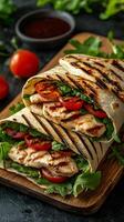 Grilled Chicken and Tomato Wrap Recipe A Delicious and Healthy Meal Idea. This recipe features grilled chicken breast, fresh tomat photo