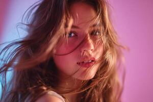 Captivating Woman Portrait A Study in Light and Shadow. This stunning photograph showcases a models beauty, with vibrant colors a photo
