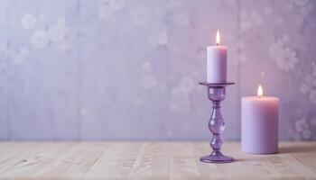 Candles Illuminating a Serene Space With a Soft Purple Backdrop Creating a Calm Atmosphere photo