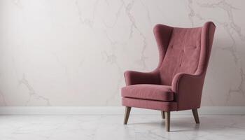 Cozy Pink Armchair Positioned Against a Marble Backdrop in a Modern Interior Setting photo