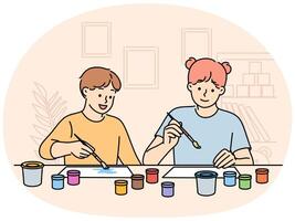 Children sit at table doing joint creativity draw pictures using watercolor or gouache vector