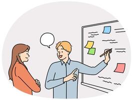 Man and woman employees of startup stand at whiteboard are brainstorming vector