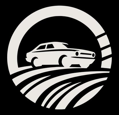 Old car is driving on a road in a circle