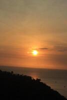 Sunset over the South Java Coast photo
