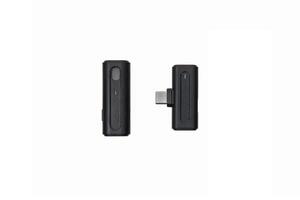 Close-up of a wireless lavalier microphone and USB-C receiver isolated on white back photo