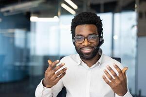 A cheerful, friendly face of a customer service representative with a headset, ready to help and provide support in a modern office setting. photo