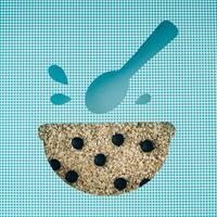 Oat flakes and fresh berries visible through a bowl and spoon shaped cutout on white and blue background. Conceptual food backdrop of musli and granola. Creative healthy breakfast flat lay. Top view. photo