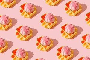 Seamless waffle pattern with pink ice cream scoops and raspberries on pastel pink background. Sweet and playful dessert themed texture, perfect for packaging design, backgrounds or summer visuals. photo