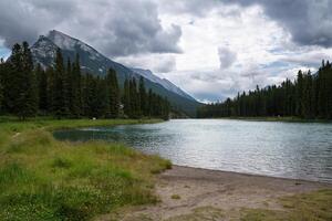 A river with a mountain in the background photo