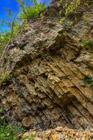 View of the Geological Outcrop with Cretaceous Rock layers photo