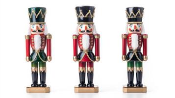 Three festive Christmas nutcrackers displayed against a clean white background, showcasing traditional holiday cheer and craftsmanship photo