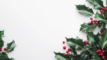 Festive holly leaves and berries elegantly arranged on a clean white background, perfect for holiday decorations and seasonal crafts photo