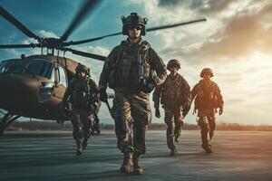 Military personnel equipped for deployment exiting helicopter at sunset photo