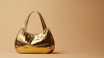 Luxurious shiny gold handbag showcased against a minimalist beige background emphasizing fashion and elegance photo