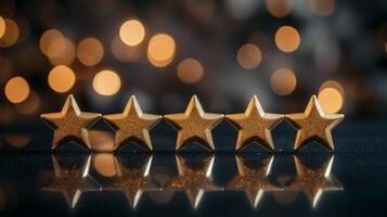 Golden five-star rating arranged on a reflective surface against a bokeh background, symbolizing excellent business service and customer experience photo