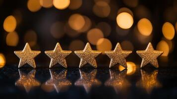 Five golden stars on a dark bokeh background representing excellent customer service and business quality ratings photo
