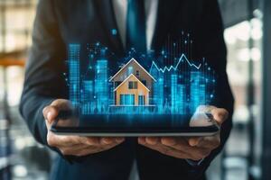Businessman showcasing a digital house model and investment graphs to illustrate real estate growth potential photo
