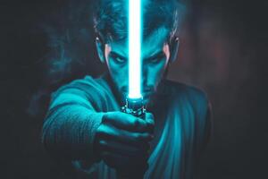 A man confidently wields a bright blue lightsaber, showcasing his strength and imagination in a dynamic pose during a captivating moment photo