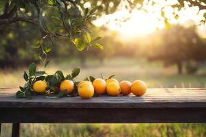 Golden hour citrus fruits arranged on a rustic table with sunlit tree field and beautiful copy space for design photo