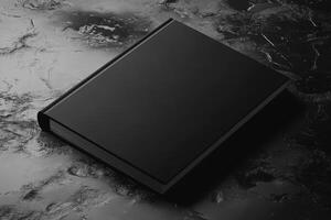 Stylish black book mockup on a dark surface ideal for design presentations and creative showcases in a contemporary setting photo