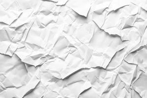 Torn piece of white paper with crumpled texture scattered on a surface in a simple indoor setting photo