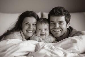 A joyful family enjoying a cozy morning together in bed, smiling and cherishing their precious moments with their little one photo