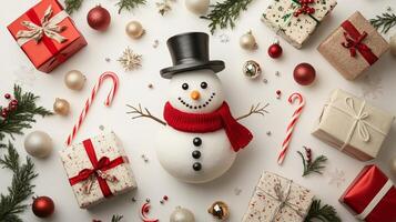 Cheerful snowman with a top hat and scarf surrounded by Christmas decorations, gifts, and candy canes in a festive holiday setting photo