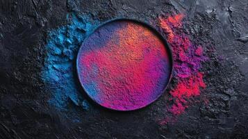 Vibrant Holi festival powders arranged in a circular pattern on a dark background celebrating color and tradition photo