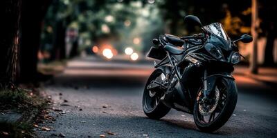 Sport motorcycle parked on a quiet street during twilight with warm bokeh lights in the background photo