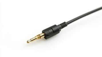 Connector cable with gold-plated tip showcasing detailed design for audio devices and equipment in a studio setting photo