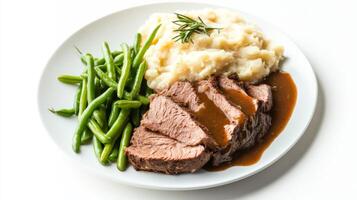 Savory roast beef with creamy mashed potatoes and fresh green beans served on a white plate at dinnertime photo