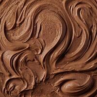 Rich Brown Chocolate Frosting Surface with Swirls and Textured Appearance photo