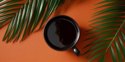 Dark Coffee in a Mug, Surrounded by Palm Leaves photo