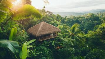 A cozy stilt house sits among the dense greenery of a tropical jungle, illuminated by the soft glow of the sunrise, showcasing nature's beauty and tranquility photo