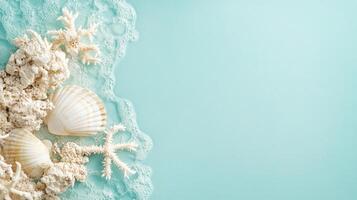 Seashells and coral pieces are beautifully arranged on a soft blue surface, perfect for creating beach-themed decor or summer marketing materials photo