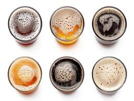 Variety of craft beers with different colors and foam levels displayed photo