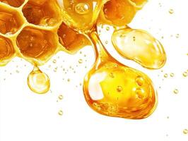 Honey dripping from honeycomb on a bright background photo