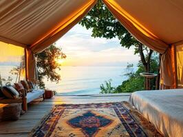 Relaxing glamping spot overlooking the ocean at sunrise photo