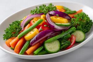 Fresh vegetable salad with parsley dressing sitting on white plate photo