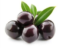 Fresh black olives displayed with green leaves on a white background photo