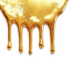 Dripping golden liquid on a white background creates a striking visual photo