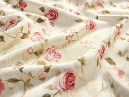 Beautiful floral fabric with pink roses on soft background photo
