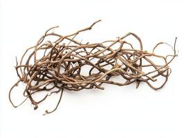 Natural tangled branches on a white surface photo