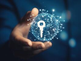 Hand holding a glowing sphere with a key symbol representing security photo