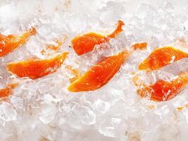 Fresh salmon fillets displayed on ice at a market photo